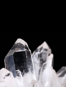 Quartz crystals on black background