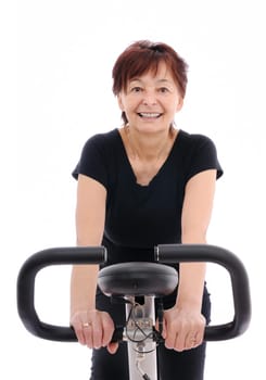 Spinning - smiling senior woman - isolated