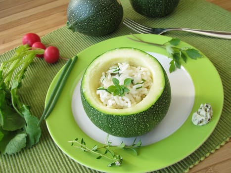 Scoop zucchini stuffed with herb rice