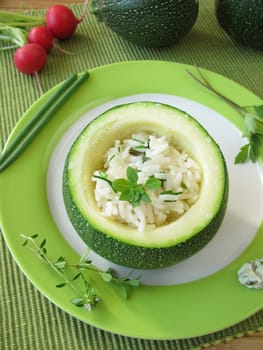 Scoop zucchini stuffed with herb rice