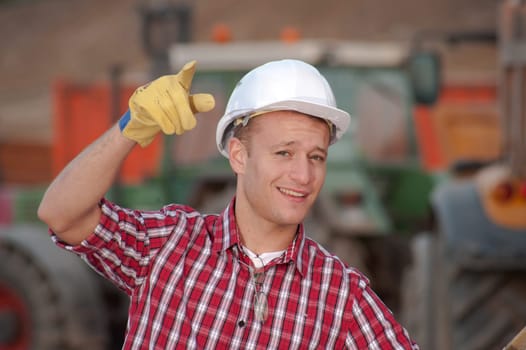 Architect working outdoors on a construction site