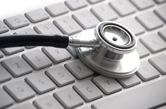 Stethoscop on a computer keyboard