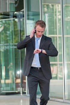 Young business man with a telephon