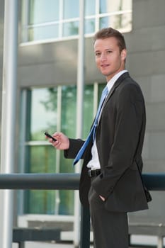 Young business man with a telephon