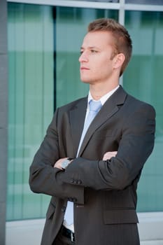 Young business man looking to the future