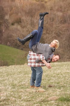 Portrait Of Energetic Young Couple Having Fun
