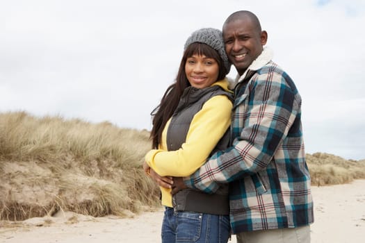 Romantic Young Couple On Winter Beach