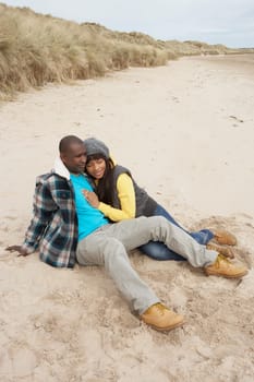 Romantic Young Couple On Winter Beach