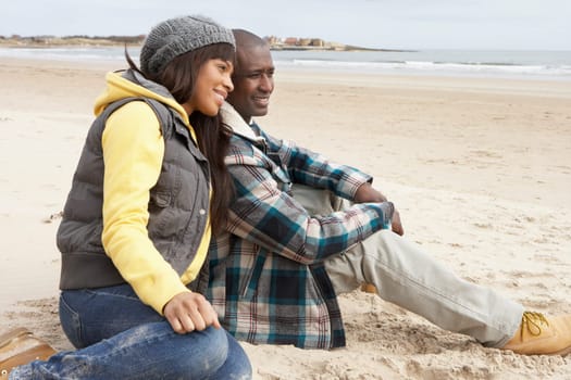 Romantic Young Couple On Winter Beach
