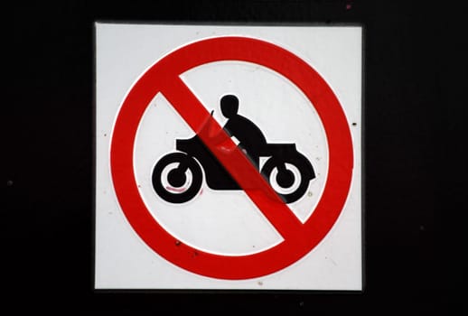 Road sign denoting no through road for motorcycles