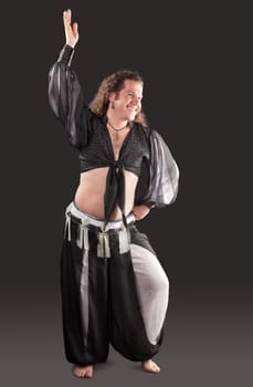 Man dance in oriental arabian costume - black and white