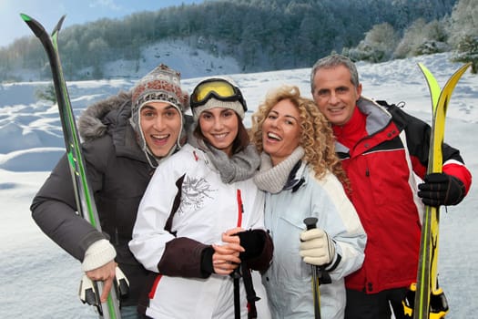 Group of happy friends in winter vacation