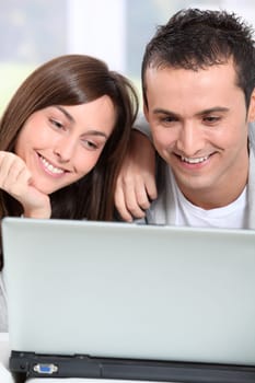 Young couple surfing on internet