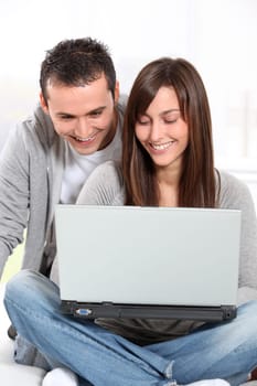 Young couple surfing on internet