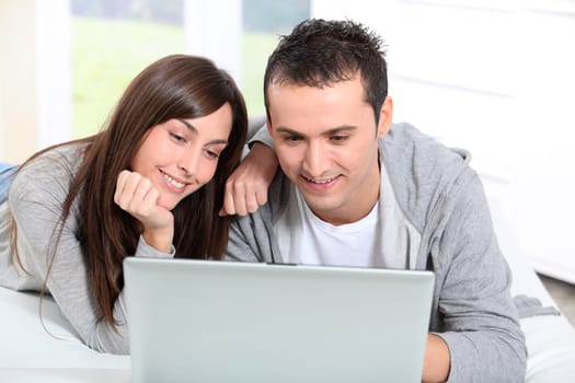 Young couple surfing on internet
