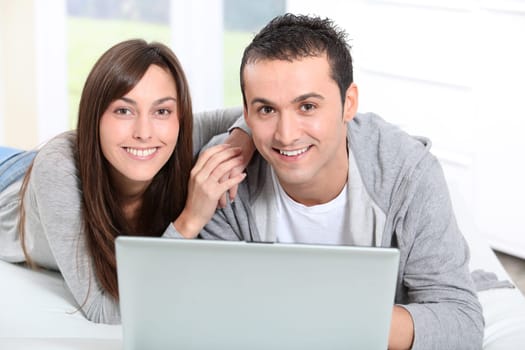 Young couple surfing on internet