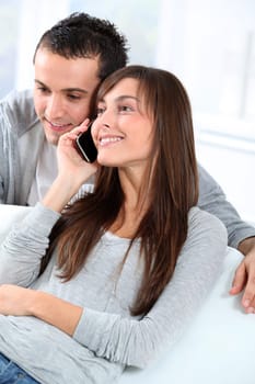 Young couple on telephone conversation