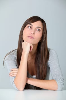 Closeup of young woman with doubtful look