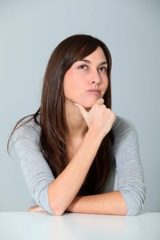 Closeup of young woman with doubtful look