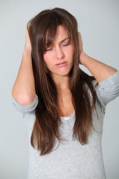 Young woman having migraine