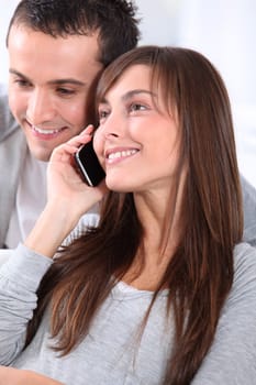 Young couple on telephone conversation