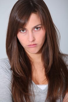 Closeup of upset young woman