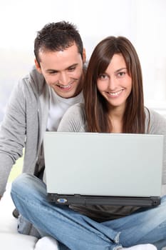 Young couple surfing on internet