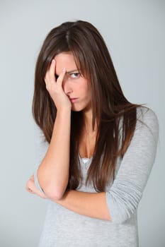 Closeup of upset young woman