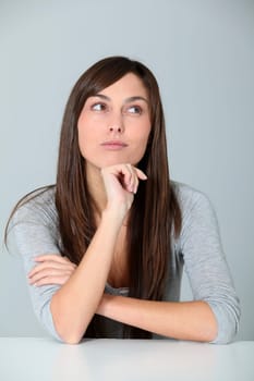 Closeup of young woman with doubtful look