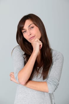 Closeup of young woman with doubtful look