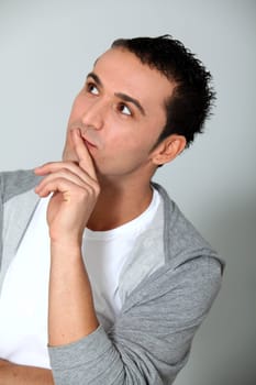 Closeup of young man on white background