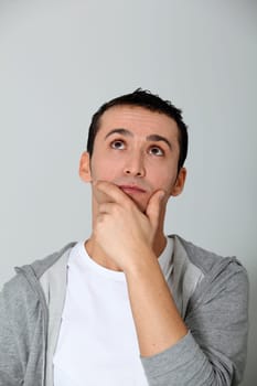 Closeup of young man looking up
