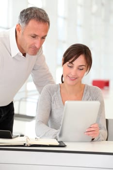 Business people working in ofice with electronic pad