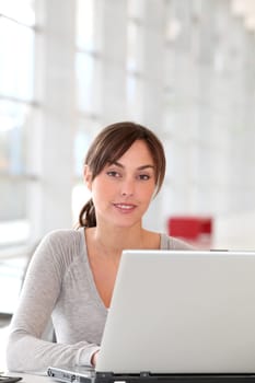 Closeup of beautiful woman working in the office