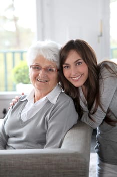 Closeup of elderly woman with young woman