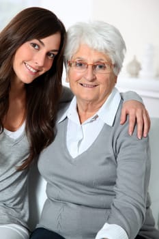 Closeup of elderly woman with young woman