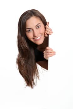 Woman in black dress showing message on white board