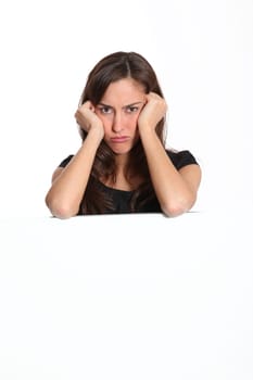Woman with upset look on white background