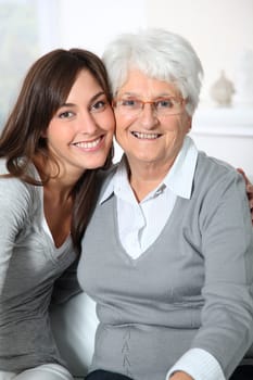 Closeup of elderly woman with young woman