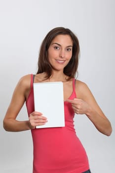 Smiling woman showing message sign