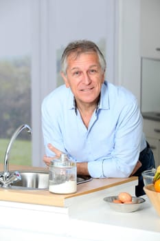 Closeup of senior man in home kitchen