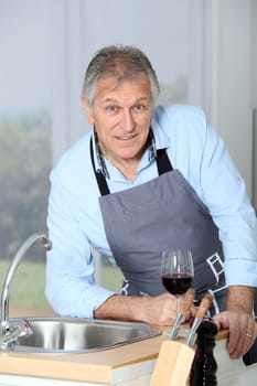 Closeup of senior man in home kitchen