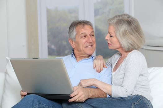 Senior couple surfing on internet