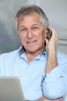Closeup of senior man talking on the phone