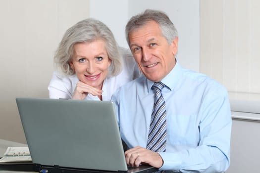 Business partners working on the office