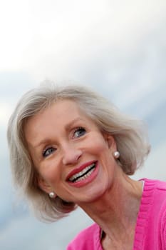 Portrait of laughing senior woman