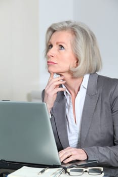 Senior businesswoman working in the office