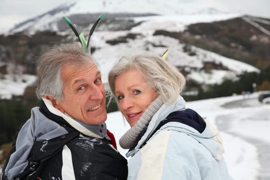 Portrait of senior couple in ski resort