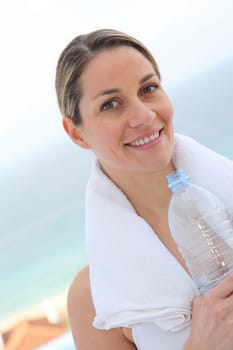 Woman drinking water from bottle