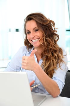 Happy businesswoman with positive attitude